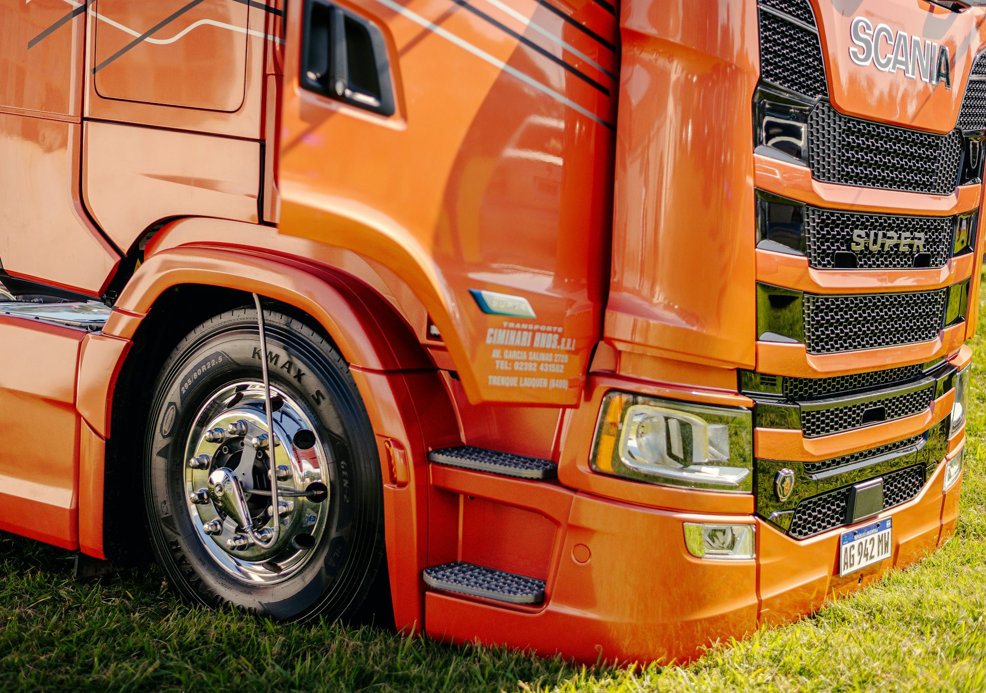 Semi truck on a highway under an orange sky