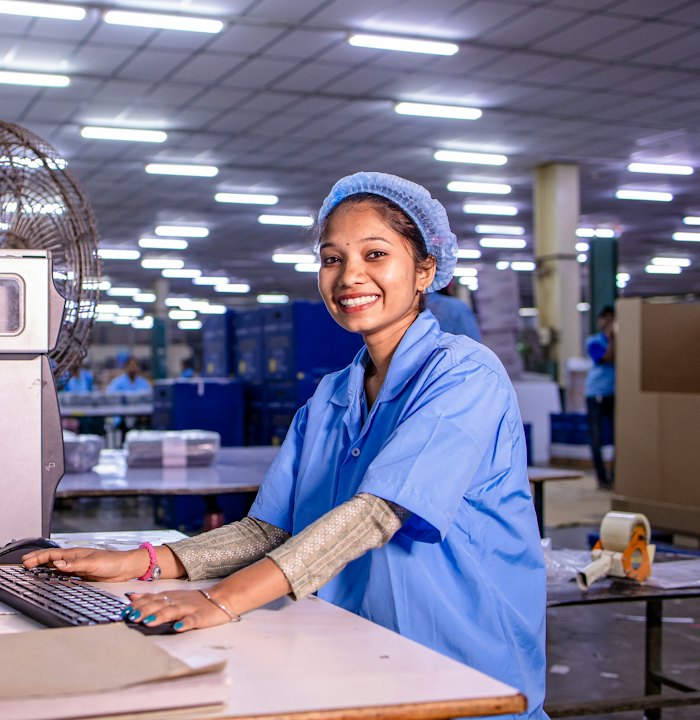 Operator working at a computer in a factory