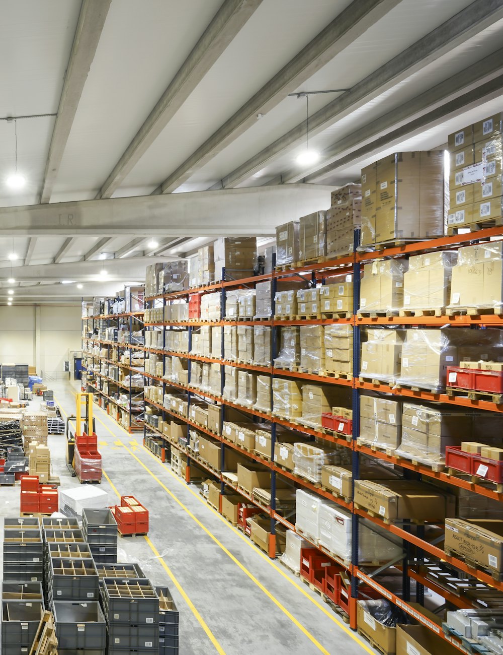 Automated warehouse with rows of stacked boxes
